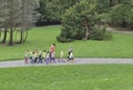 Educators with a group of preschool children in the park