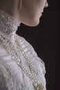 Edwardian woman in white blouse close up