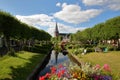 Eegracht canal surrounded by beautiful gardens in IJlst, Friesland, Netherlands