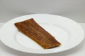 Eel fish fillet on a white plate Royalty Free Stock Photo