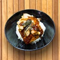 Eel on rice unagi in a bowl on wooden table Royalty Free Stock Photo