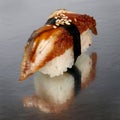 Eel sushi on a shiny surface. Japanese kitchen Royalty Free Stock Photo