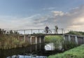 A cyclist is photographed on the bridge