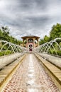 Eenage boy standing at a fountain Royalty Free Stock Photo