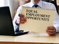 EEO equal employment opportunity. Manager shows the rules and guidelines.