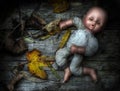 Eerie image of an abandoned doll.