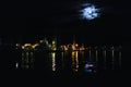 Eerie moon over water Royalty Free Stock Photo