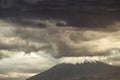 Eerie scenery of Biblical Mount Ararat with dark clouds above it