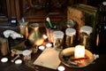 Eerie witches` kitchen with ingredients for potion and blank sheet of paper for Halloween