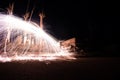 Effect of sparks of incandescent steel. Long exposure photo. Fire wall in the abandoned city of Epecuen