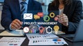 Effective project management strategy collaboration and teamwork business concept involving two professionals working on project Royalty Free Stock Photo