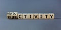 Effectivity and productivity symbol. Turned wooden cubes and changed the word productivity to effectivity. Beautiful grey