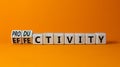 Effectivity and productivity symbol. Turned wooden cubes and changed the word productivity to effectivity. Beautiful orange