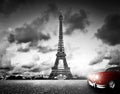 Effel Tower, Paris, France and retro red car.