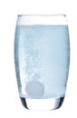 Effervescent tablet in glass with water