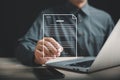 Efficient document management Businessman uses pen to sign electronic documents on virtual screen