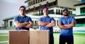 Efficient movers load van with boxes Royalty Free Stock Photo