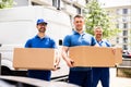 Efficient Truck Movers Transporting Boxes for House Relocation Royalty Free Stock Photo