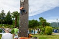 Effort of a boy in climbing a wall Royalty Free Stock Photo