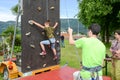 Effort of a boy in climbing a wall Royalty Free Stock Photo