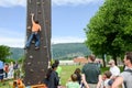 Effort of a boy in climbing a wall Royalty Free Stock Photo