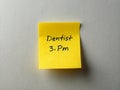Effortless Dental Appointment Reminder A Clean Minimalist Postit Note Design for Prompt Scheduling Royalty Free Stock Photo