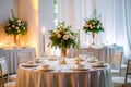 Effortless Elegance A Minimalist Wedding Reception Table Setting with White Decor and Simple Centerpieces Royalty Free Stock Photo