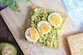 Egg and avocado toast. Top view tost Royalty Free Stock Photo