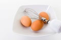 Egg beater with eggs Royalty Free Stock Photo