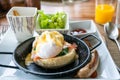 Egg benedict with bacon and sausage Royalty Free Stock Photo