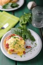 Egg benedict delish food, crispy bacon Royalty Free Stock Photo