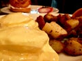 Egg Benedict and Potatoes