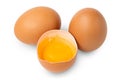 Egg. Brown eggs. Half an egg with yellow yolk. Organic raw non boiled chicken eggs. Brown eggshell. Royalty Free Stock Photo