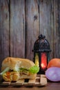 Egg burger, onion, eggs, tomato and lantern