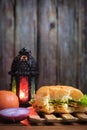 Egg burger, onion, eggs, tomato and lantern