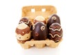 Egg carton with decorated easter eggs Royalty Free Stock Photo