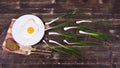 Egg , chives, bread, plate, knife and fork Royalty Free Stock Photo