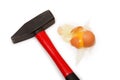 Egg cracked with hammer Royalty Free Stock Photo