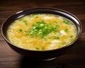 Egg Drop Soup is a Chinese soup made by pouring beaten eggs into a chicken.