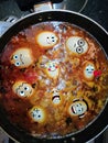 Egg emoji while cooking