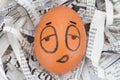 egg face sleepy on newspapers recycle