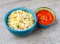 Egg fried rice with chicken manchurian served in dish isolated on background top view of asian food Royalty Free Stock Photo