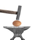 Egg, hammer, and anvil isolated Royalty Free Stock Photo