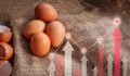 Egg with high finance red and white graph. Food high price concept Royalty Free Stock Photo