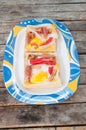 Egg in a hole toast cut out sprinkled with crab stick Royalty Free Stock Photo