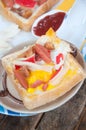 Egg, hotdog and crab stick in a hole of bread Royalty Free Stock Photo