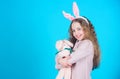 Egg hunt. Family holiday. Spring party. Little girl with hare toy. Happy easter. Child in rabbit bunny ears. copy space Royalty Free Stock Photo