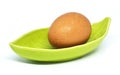 Egg and leaf plate on white background Royalty Free Stock Photo