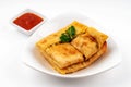 Egg murtabak or martabak Jawa vegetables stuffed pancake on white background