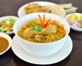 Egg noodle in chicken curry soup Kao Soi Kai , Thai Northern style food Royalty Free Stock Photo